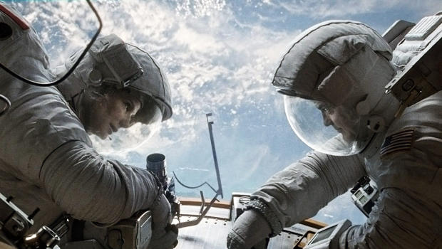 Bullock and Clooney repairing the Hubble