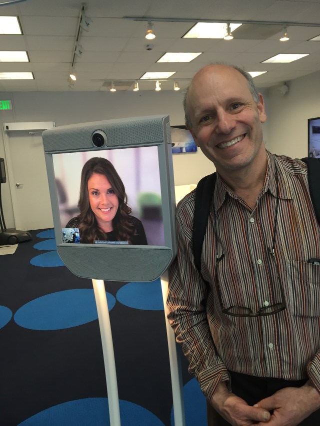 Ted Selker and a Beam agent on a telepresence robot