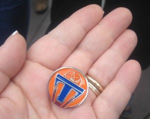 tomorrowland_pin_in_hand